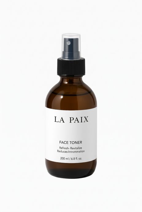 La Paix-tonerbottel reguit vorentoe op ’n skoon wit agtergrond